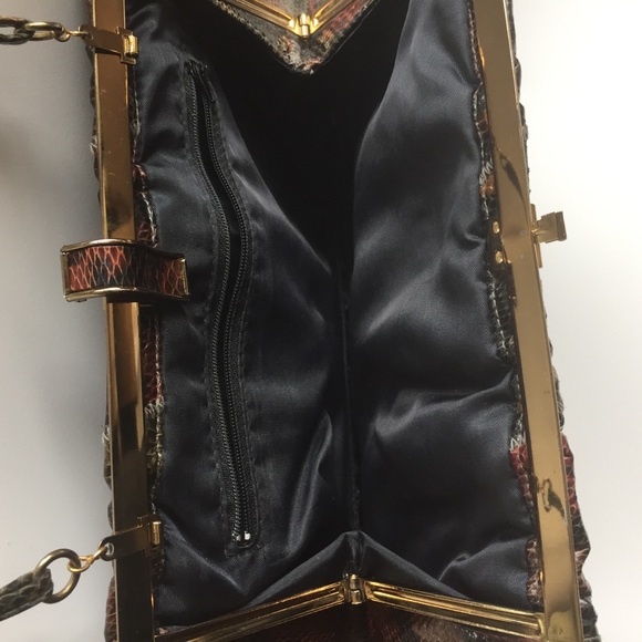 Vintage snake clutch handbag